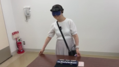 座っていたところに戻ってきた画像